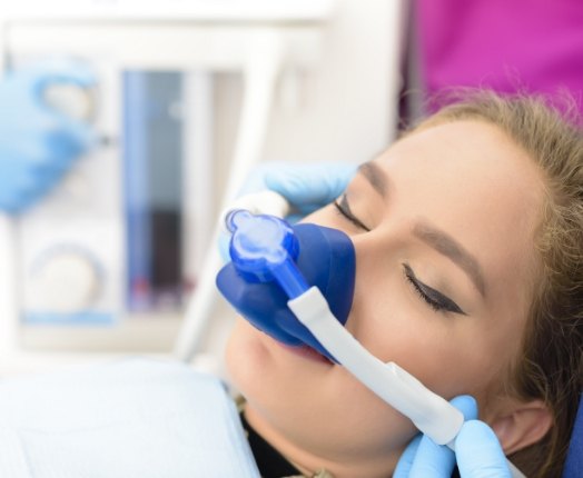 Dental patient receiving nitrous oxide sedation dentistry