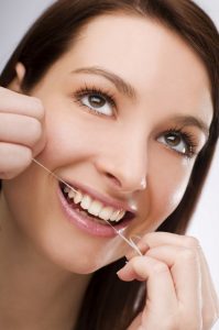 Your family dentist in Temple explains the importance of flossing daily.