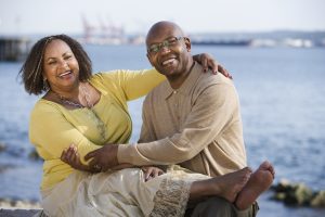 couple smiling on the beach