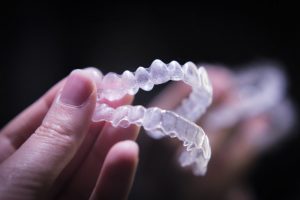 Invisalign clear aligners.