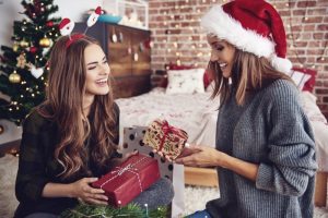 woman red hat grey sweater