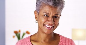 older woman smiling grey hair