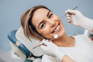 woman visiting dentist in Temple