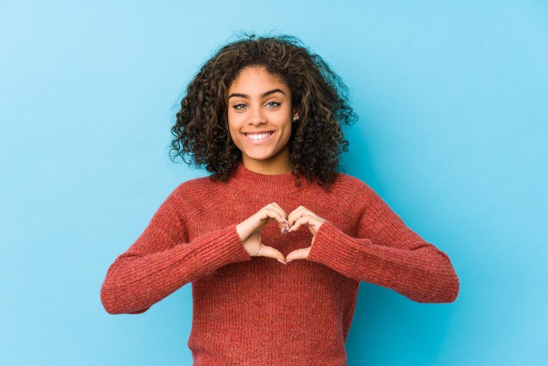 woman smiling for Valentine’s Day dental gifts in Temple