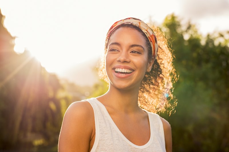 Woman smiling outside