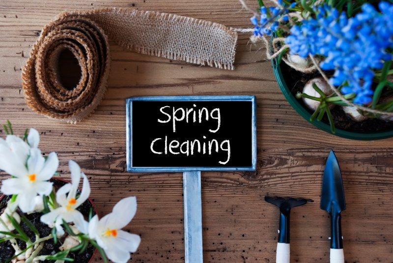 A sign with text reading 'Spring Cleaning'