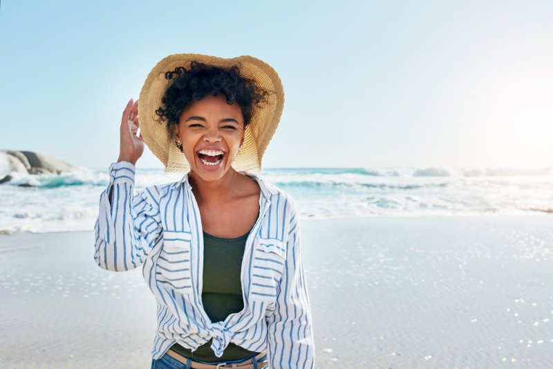 A smiling woman enjoying her summer vacation