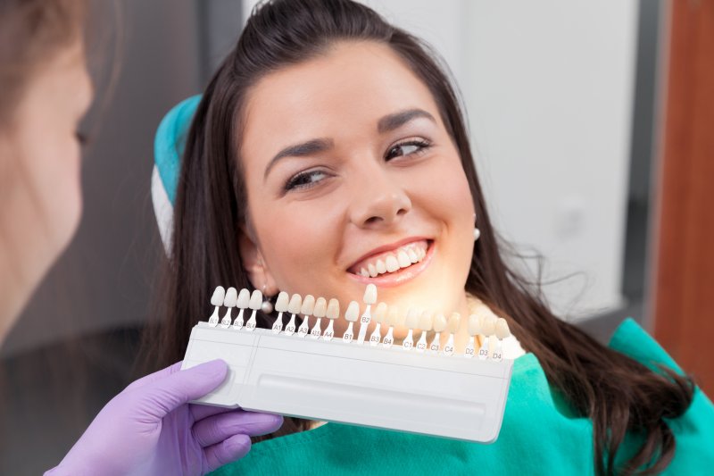 A woman being prepped for cosmetic dentistry